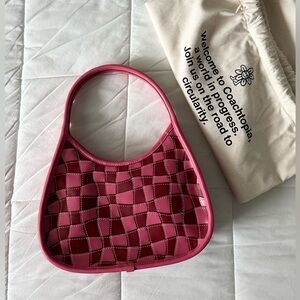 Coachtopia Ergo Bag in discontinued vibrant pink tone checker pattern